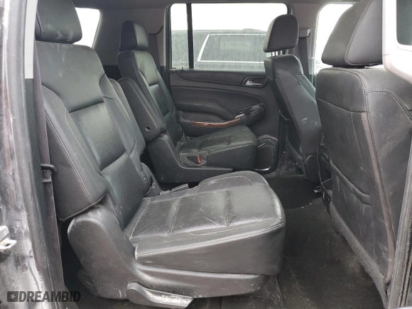 2017 Chevrolet Suburban Premier with VIN 1GNSKJKCXHR403076, listed as a Copart auction lot 46606025 with 99,481 mi miles and Salvage Title. Bid and sale history available at carsss.com. Image 11.