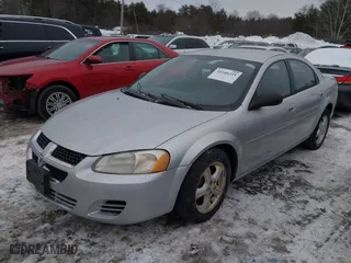2004 Dodge Stratus SXT with VIN 1B3EL46X44N210281, listed as a IAAI auction lot 41546221 with 121,902 mi miles. Bid and sale history available at carsss.com. Image 2.
