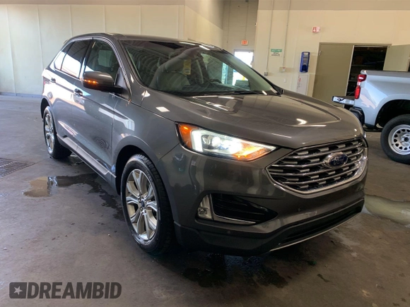 2021 Ford Edge Titanium z VIN 2FMPK3K92MBA53689, wystawiony jako IAAI lot #42501151 z przebiegiem 93 941 mil mil oraz . Historia ofert i sprzedaży dostępna na DreamBid. Obrazek 5.