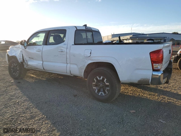 2016 Toyota Tacoma SR5 with VIN 3TMBZ5DN2GM002504, listed as a Copart auction lot 80988494 with 115,230 mi miles and Salvage Title. Bid and sale history available at carsss.com. Image 2.