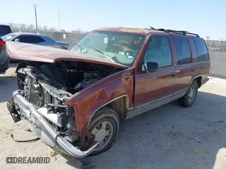 1999 Chevrolet Tahoe with VIN 1GNEC13R9XJ341261, listed as a IAAI auction lot 41741710 with 234,676 mi miles. Bid and sale history available at carsss.com. Image 16.
