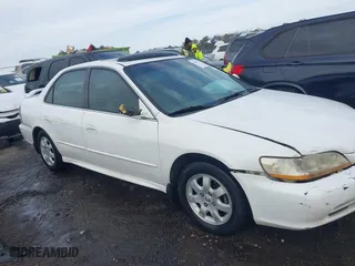 2002 Honda Accord Sdn EX with VIN JHMCG56632C004934, listed as a IAAI auction lot 41595113 with 298,868 mi miles. Bid and sale history available at carsss.com. Image 13.