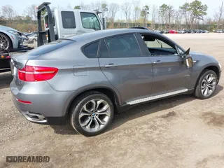 2012 BMW X6 50i with VIN 5UXFG8C57CLZ97446, listed as a IAAI auction lot 42054724 with 131,079 mi miles. Bid and sale history available at carsss.com. Image 4.