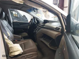 2012 Honda Odyssey Touring with VIN 5FNRL5H96CB134466, listed as a IAAI auction lot 41895655 with 127,672 mi miles. Bid and sale history available at carsss.com. Image 5.