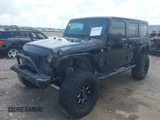 2008 Jeep Wrangler Unlimited X z VIN 1J4GA39148L560004, wystawiony jako IAAI lot #42523657 z przebiegiem 116 619 mil mil oraz . Historia ofert i sprzedaży dostępna na DreamBid. Obrazek 2.