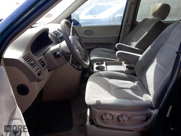 2005 Kia Sedona LX with VIN KNDUP132156641615, listed as a Copart auction lot 79973224 with 205,018 mi miles and Non Repairable. Bid and sale history available at carsss.com. Image 7.