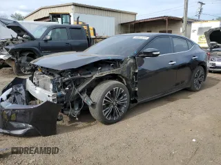 2016 Nissan Maxima SR with VIN 1N4AA6AP9GC447540, listed as a Copart auction lot 60861815 with 127,420 mi miles and Salvage title. Bid and sale history available at DreamBid. Image 1.