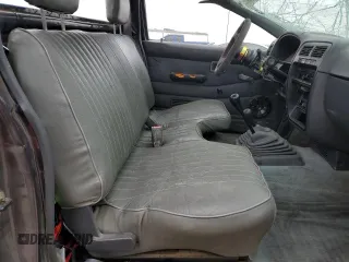 1995 Nissan Frontier XE with VIN 1N6SD11Y2SC308065, listed as a Copart auction lot 45282595 with 51,994 mi miles and Salvage title. Bid and sale history available at DreamBid. Image 7.