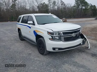 2018 Chevrolet Tahoe Commercial z VIN 1GNLCDEC0JR223125, wystawiony jako IAAI lot #41540653 z przebiegiem 147 995 mil mil oraz . Historia ofert i sprzedaży dostępna na DreamBid. Obrazek 1.