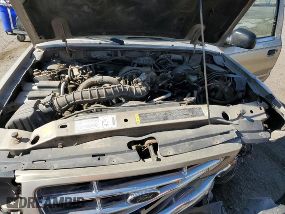 2001 Ford Ranger XL z VIN 1FTYR14U41PA85591, wystawiony jako Copart lot #59917615 z przebiegiem 257 547 mil mil oraz Szkoda całkowita • Salvage title. Historia ofert i sprzedaży dostępna na DreamBid. Obrazek 11.