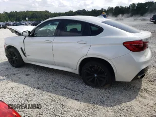 2019 BMW X6 xDrive35i with VIN 5UXKU2C52K0Z64679, listed as a Copart auction lot 69003673 with Not Provided miles. Bid and sale history available at carsss.com. Image 2.