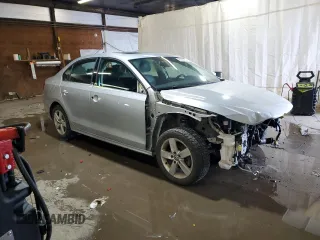 2014 Volkswagen Jetta TDI w/Premium with VIN 3VW3L7AJ3EM310892, listed as a Copart auction lot 61235765 with 242,970 mi miles and Salvage title. Bid and sale history available at DreamBid. Image 4.