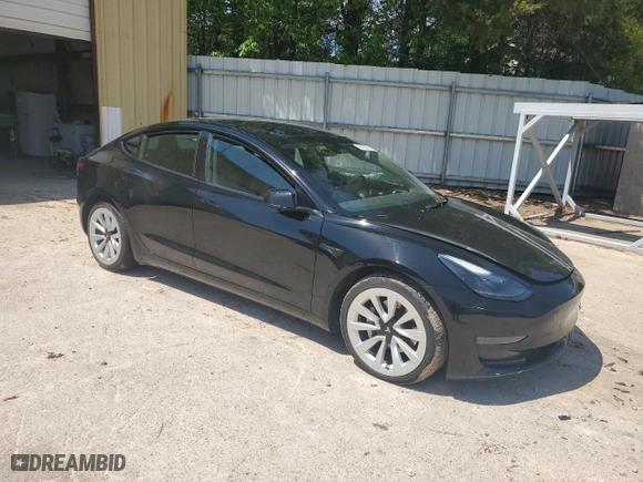 2023 Tesla Model 3 with VIN 5YJ3E1EA2PF438438, listed as a Copart auction lot 52901375 with 63,181 mi miles and Salvage Title. Bid and sale history available at carsss.com. Image 4.