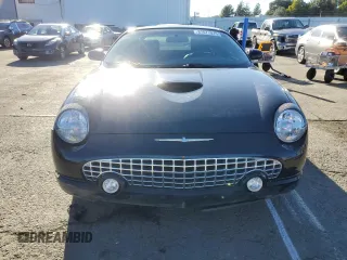2004 Ford Thunderbird Deluxe with VIN 1FAHP60A94Y105675, listed as a Copart auction lot 87677015 with 91,154 mi miles and Salvage Title. Bid and sale history available at DreamBid. Image 5.