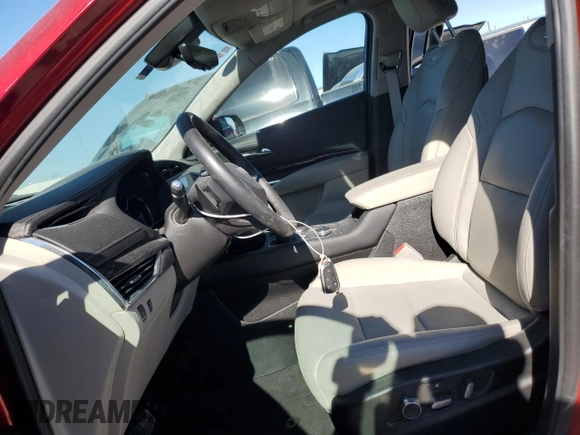 2022 Cadillac XT4 FWD Premium Luxury with VIN 1GYFZCR43NF154997, listed as a Copart auction lot 81942214 with 22,697 mi miles and Salvage title. Bid and sale history available at DreamBid. Image 7.
