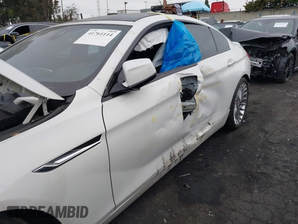 2015 BMW 6 Series 650i xDrive with VIN WBA6B4C53FD899938, listed as a IAAI auction lot 41761114 with 93,015 mi miles and . Bid and sale history available at carsss.com. Image 6.