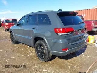 2018 Jeep Grand Cherokee Laredo E with VIN 1C4RJFAG4JC370502, listed as a IAAI auction lot 41342367 with 104,307 mi miles. Bid and sale history available at carsss.com. Image 3.