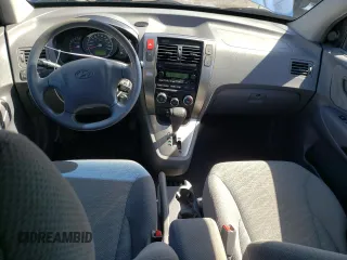 2005 Hyundai Tucson GL with VIN KM8JM72D55U167063, listed as a Copart auction lot 52002865 with 157,945 mi miles and Salvage Title. Bid and sale history available at carsss.com. Image 8.