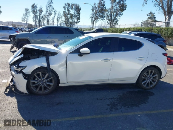 2020 Mazda Mazda3 Hatchback with VIN JM1BPALM8L1155418, listed as a IAAI auction lot 41285148 with 42,781 mi miles. Bid and sale history available at carsss.com. Image 14.