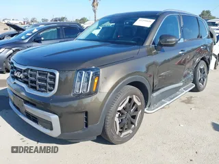 2023 Kia Telluride S with VIN 5XYP6DGC2PG387093, listed as a IAAI auction lot 42299026 with 12,895 mi miles and . Bid and sale history available at DreamBid. Image 20.