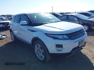 2014 Land Rover Range Rover Evoque Pure Plus z VIN SALVP2BG1EH876312, wystawiony jako IAAI lot #41442826 z przebiegiem 135 370 mil mil oraz . Historia ofert i sprzedaży dostępna na DreamBid. Obrazek 1.