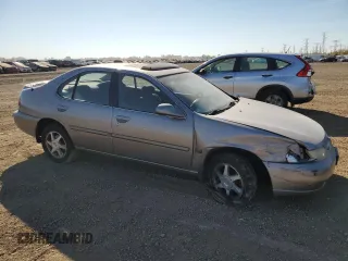 1999 Nissan Altima XE with VIN 1N4DL01D3XC245903, listed as a Copart auction lot 77186334 with 158,590 mi miles and Salvage Title. Bid and sale history available at carsss.com. Image 4.