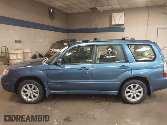 2007 Subaru Forester X w/Premium Pkg with VIN JF1SG65687G716673, listed as a IAAI auction lot 41539553 with 186,870 mi miles. Bid and sale history available at carsss.com. Image 12.