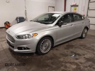 2016 Ford Fusion Titanium with VIN 3FA6P0K96GR150907, listed as a IAAI auction lot 42291933 with 200,463 mi miles and . Bid and sale history available at DreamBid. Image 2.