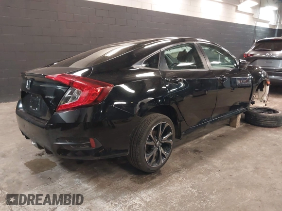 2019 Honda Civic Sport with VIN 2HGFC2F84KH590469, listed as a IAAI auction lot 41686757 with 79,602 mi miles and . Bid and sale history available at DreamBid. Image 4.