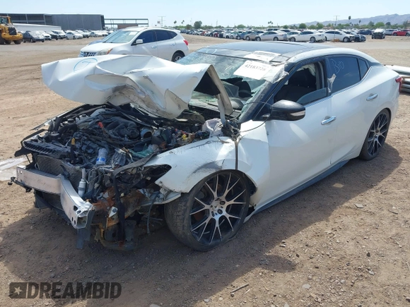2016 Nissan Maxima SV with VIN 1N4AA6AP8GC379439, listed as a IAAI auction lot 42183728 with 107,857 mi miles and . Bid and sale history available at DreamBid. Image 16.