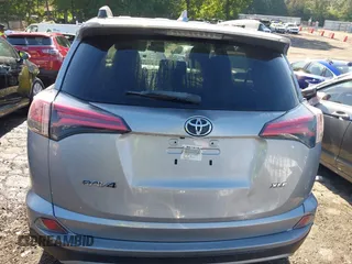 2018 Toyota RAV4 XLE with VIN 2T3WFREV6JW442859, listed as a IAAI auction lot 42252071 with 67,749 mi miles and . Bid and sale history available at DreamBid. Image 16.