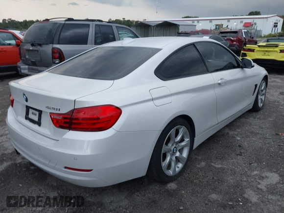 2015 BMW 4 Series 428i with VIN WBA3N3C54FK233803, listed as a IAAI auction lot 40481486 with 74,556 mi miles and . Bid and sale history available at DreamBid. Image 4.