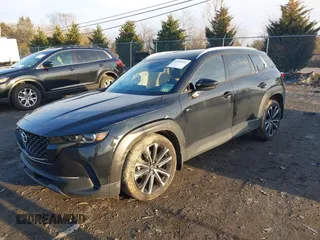 2024 Mazda CX-50 S Premium Plus z VIN 7MMVABEM5RN209065, wystawiony jako IAAI lot #41525183 z przebiegiem 12 297 mil mil oraz . Historia ofert i sprzedaży dostępna na DreamBid. Obrazek 17.