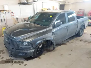 2018 Ram 1500 Rebel with VIN 1C6RR7YT1JS234777, listed as a IAAI auction lot 41409525 with 119,497 mi miles. Bid and sale history available at carsss.com. Image 2.