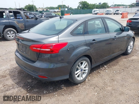 2016 Ford Focus SE with VIN 1FADP3F21GL387227, listed as a IAAI auction lot 42438650 with 59,969 mi miles and . Bid and sale history available at DreamBid. Image 4.