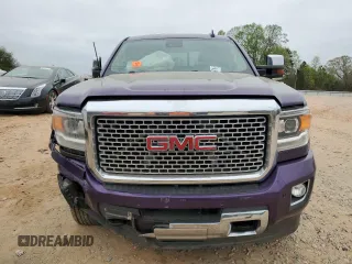 2017 GMC Sierra 2500HD Denali z VIN 1GT12UEG4HF127967, wystawiony jako Copart lot #51812665 z przebiegiem Nie podano mil oraz Szkody całkowita. Historia ofert i sprzedaży dostępna na DreamBid. Obrazek 5.
