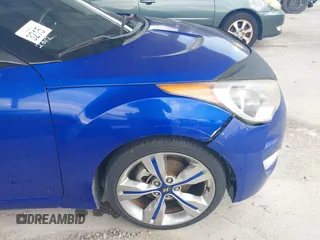 2012 Hyundai Veloster w/Gray Int z VIN KMHTC6AD0CU034683, wystawiony jako IAAI lot #42395112 z przebiegiem 134 388 mil mil oraz . Historia ofert i sprzedaży dostępna na DreamBid. Obrazek 15.