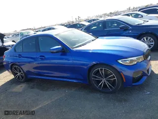2020 BMW 3 Series 330i with VIN WBA5R1C05LFH66384, listed as a IAAI auction lot 41810255 with 59,433 mi miles. Bid and sale history available at carsss.com. Image 13.