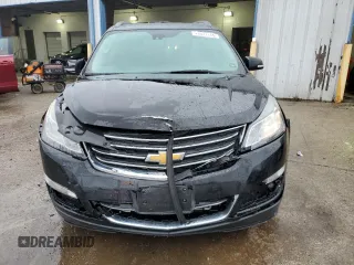 2017 Chevrolet Traverse Premier with VIN 1GNKVJKD4HJ174490, listed as a Copart auction lot 43977115 with 130,144 mi miles and Salvage Title. Bid and sale history available at DreamBid. Image 5.