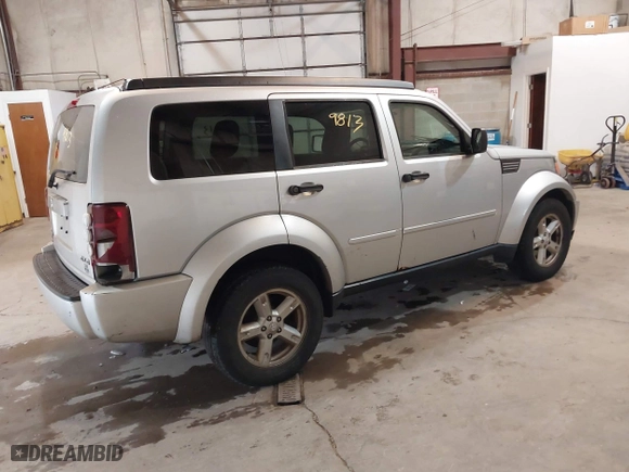 2007 Dodge Nitro SLT with VIN 1D8GU58K97W616455, listed as a IAAI auction lot 41229813 with 199,421 mi miles. Bid and sale history available at carsss.com. Image 4.
