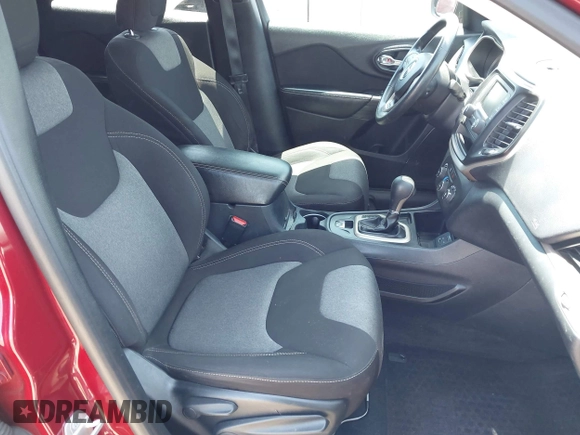 2016 Jeep Cherokee Sport with VIN 1C4PJLAB8GW216912, listed as a IAAI auction lot 42336479 with 104,396 mi miles and . Bid and sale history available at DreamBid. Image 5.