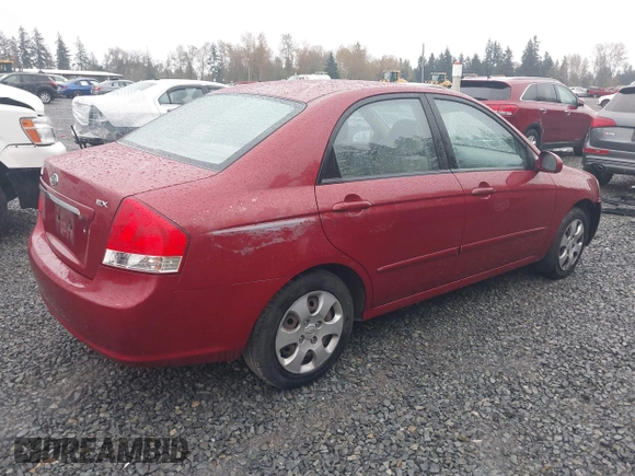 2009 Kia Spectra EX with VIN KNAFE222695621925, listed as a IAAI auction lot 40657622 with 135,647 mi miles. Bid and sale history available at carsss.com. Image 4.