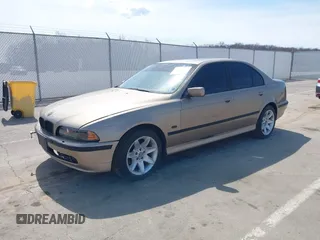 2000 BMW 5 Series 528i with VIN WBADM6348YGV00883, listed as a IAAI auction lot 41898075 with 175,137 mi miles and . Bid and sale history available at DreamBid. Image 2.