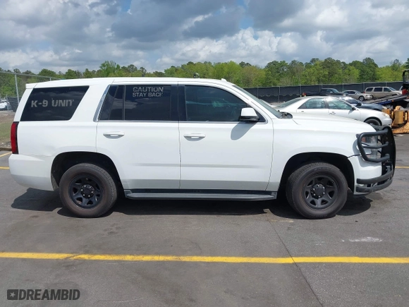 2016 Chevrolet Tahoe Commercial with VIN 1GNLCDEC5GR423300, listed as a IAAI auction lot 41967399 with 147,429 mi miles. Bid and sale history available at carsss.com. Image 13.
