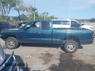 1998 Dodge Dakota with VIN 1B7FL22P3WS694381, listed as a IAAI auction lot 41930575 with 236,444 mi miles. Bid and sale history available at carsss.com. Image 15.