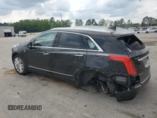 2018 Cadillac XT5 Premium Luxury FWD z VIN 1GYKNERS9JZ234513, wystawiony jako Copart lot #54105735 z przebiegiem 127 345 mil mil oraz Szkoda całkowita • Salvage title. Historia ofert i sprzedaży dostępna na DreamBid. Obrazek 2.