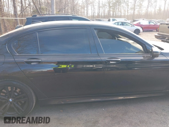 2019 BMW 7 Series 750i xDrive with VIN WBA7F2C52KB240302, listed as a IAAI auction lot 40984933 with 93,737 mi miles and . Bid and sale history available at DreamBid. Image 13.