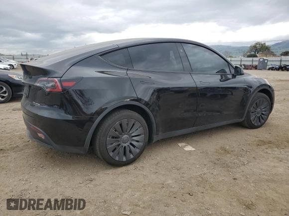 2023 Tesla Model Y Long Range with VIN 7SAYGDEE1PF923998, listed as a Copart auction lot 48954205 with 21,525 mi miles and Salvage Title. Bid and sale history available at DreamBid. Image 3.