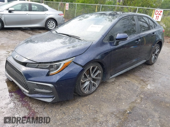 2021 Toyota Corolla SE with VIN JTDS4MCE6MJ054785, listed as a IAAI auction lot 41881709 with 62,833 mi miles. Bid and sale history available at carsss.com. Image 2.