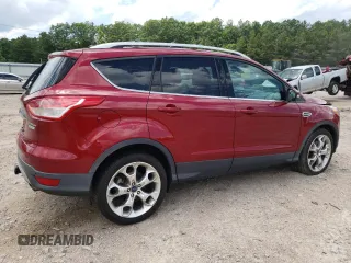 2014 Ford Escape Titanium с VIN 1FMCU0J98EUD63592, выставлен на аукционе Copart как лот 51737595 с пробегом 69 223 миль миль и На запчасти • Non repairable. История ставок и продаж доступна на DreamBid. Изображение 3.